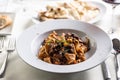 Papardelle al cinghiale, a Sienese typical dish with game ragout in a plate