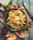 Papardelle italian pasta with fresh cherry tomatoes and basil Royalty Free Stock Photo