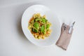 Papardelle pasta with cherry tomatos, broccoli, chive and fresh basil. Italian food. Italian cuisine. Symbolic image