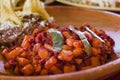 Papas with chorizo or potatoes with chorizo and refried beans, mexican food in Mexico City