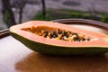 Papaya Carica papaya is an exotic, tasty, sweet fruit. Fruit of melon bread tree. Papaya seeds are edible and can be a cure.