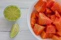 Papaya fruit with chili, mexican snack, spicy food in mexico