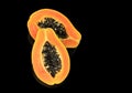Papaya fruit isolated on black background. Half of fresh organic Papaya exotic fruit close up