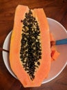 Papaya fruit with lots of seeds closeup view macro shot