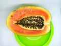 papaya fruit slices on a white background Royalty Free Stock Photo