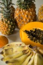 Papaya, pineapple, mango, bananas, exotic fruits on the table. Royalty Free Stock Photo