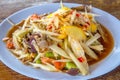 Papaya salad or SOM TAM or Somtum with crab. Famous Thai food. Royalty Free Stock Photo