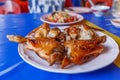 Papaya salad on table,National food of Thailand,Papaya salad and grilled Chicken select focus. Royalty Free Stock Photo