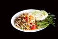 Papaya Salad Thai style Som tum serve with fresh grees vegeta