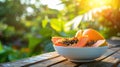 papaya in a white bowl on a wooden table nature background. Selective focus Royalty Free Stock Photo