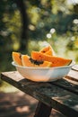 papaya in a white bowl on a wooden table nature background. Selective focus Royalty Free Stock Photo