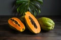 Papayas on kitchen table, tropical fruits arranged beautifully