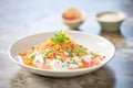papdi chaat with yogurt and sev topping