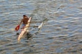 Polynesian man training on racing outrigger canoe