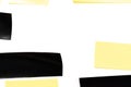 Paper adhesive scotch background. Piece of yellow and black sticky strip duct tape isolated on white. Torn grunge texture Royalty Free Stock Photo