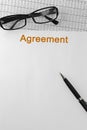 Paper with Agreement on a table Royalty Free Stock Photo