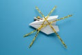 Paper airplane on blue background under quarantine. Cancellation of flights of civil and touristic aviation. Crisis of air travel Royalty Free Stock Photo