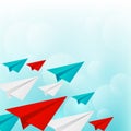Paper airplanes on blue sky background