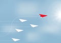 Paper airplanes flying with red airplane changing direction ahead, business competition leadership ambitious successful concept Royalty Free Stock Photo