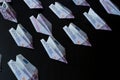 Paper airplanes made of Euro banknotes, the concept of cash flow.