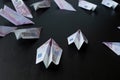 Paper airplanes made of Euro banknotes, the concept of cash flow.