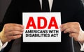 Paper with Americans with Disabilities Act ADA on a table Royalty Free Stock Photo