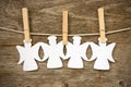 Paper angels hanging on the clothesline