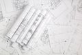 Paper architectural drawings and blueprint.