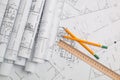 Paper architectural drawings, blueprint, ruler and pencil. Engineering blueprint Royalty Free Stock Photo
