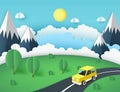 Paper art background, yellow car on the road near mountains
