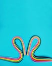 Colorful rainbow paper mini heart curve on blue background concept kid education or love of LGBT