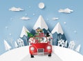 Paper art, Craft style of Santa Claus and friends in red car in the village Royalty Free Stock Photo