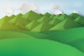 Paper art of green grass and mountains on a cloudy sky. Royalty Free Stock Photo