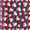Paper art heart confetti seamless pattern on striped usa color style background. Royalty Free Stock Photo