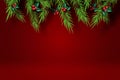 Paper art of Merry Christmas and Happy New Year with red tone background.Creative minimal pine tree and holly tree for greeting Royalty Free Stock Photo