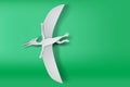 Paper art of Pteranodon dinosour on green background vector Royalty Free Stock Photo