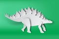 Paper art of Stegosaurus dinosour on green background vector Royalty Free Stock Photo