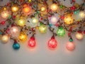 Paper background lit with colorful garland