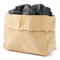 Paper bag of charcoal isolated on a white Royalty Free Stock Photo