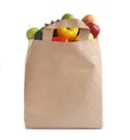 Paper bag with different groceries on white Royalty Free Stock Photo