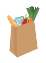 Paper bag with food. Concept of healthy food with grocery, dairy products, bakery and vegetables. Royalty Free Stock Photo
