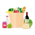 Paper bag with food. Shopping at the supermarket or grocery store. A set of healthy food. Vegetables and fruits, wine Royalty Free Stock Photo