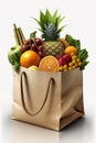 Paper bag full of fresh fruits and vegetables over white background. Royalty Free Stock Photo