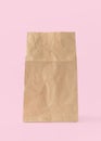 Paper bag isolated on pink white background with clipping path, eco-friendly brown food package mockup for lunch, breakfast Royalty Free Stock Photo