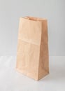 Paper bag isolated on white background with clipping path, eco-friendly brown food package mockup for lunch, breakfast or dinner Royalty Free Stock Photo