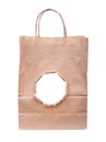Paper bag with a torn hole isolated Royalty Free Stock Photo