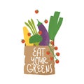 Paper bag with vegetables. Grocery shopping concept. Eat Your Greens lettering.