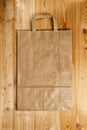 Paper bag on a wooden texture