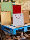 Paper bags factory colorful set on wood
