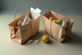 Paper bags filled with groceries floating over shopping basket Royalty Free Stock Photo